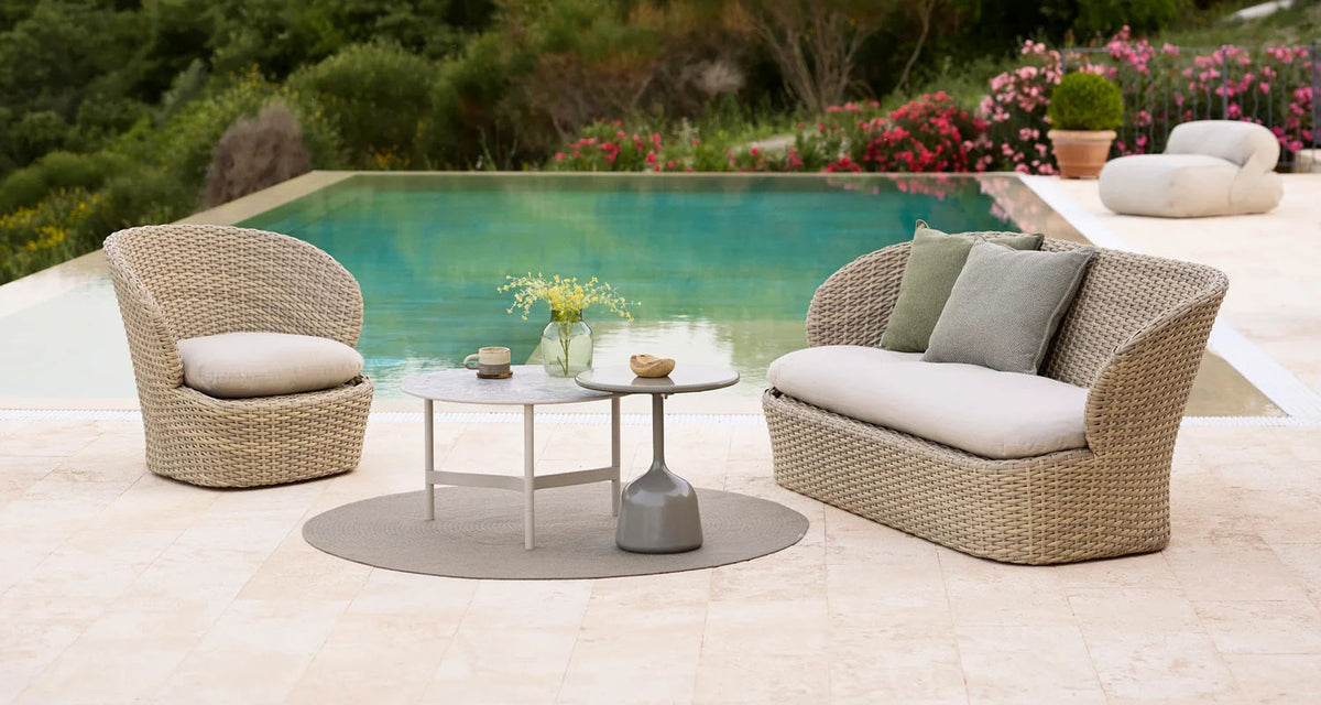 Coast 2 1/2-Seater Sofa by Cane-Line, showing coast 2 1/2-seater sofa in live shot.