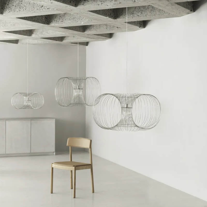 Coil Lamp by Normann Copenhagen, showing coil lamp in live shot.