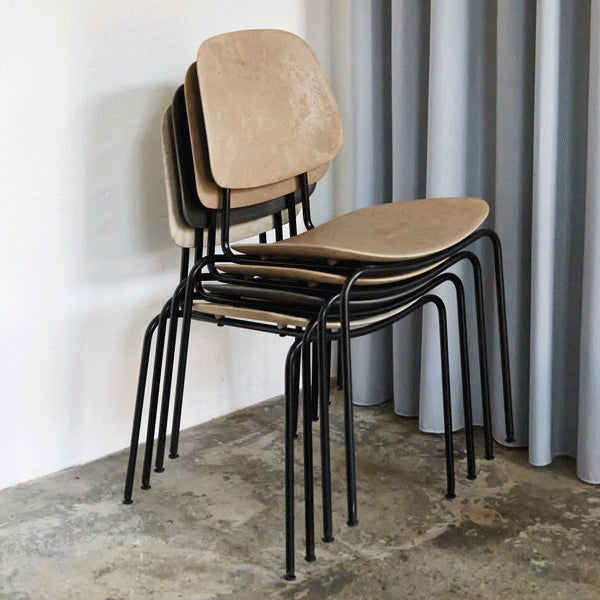 Compound Dining Chair by Mater, showing compound dining chairs in live shot.