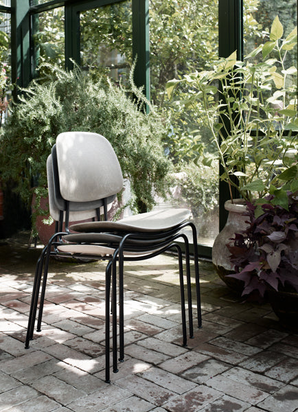 Compound Dining Chair by Mater, showing compound dining chairs in live shot.