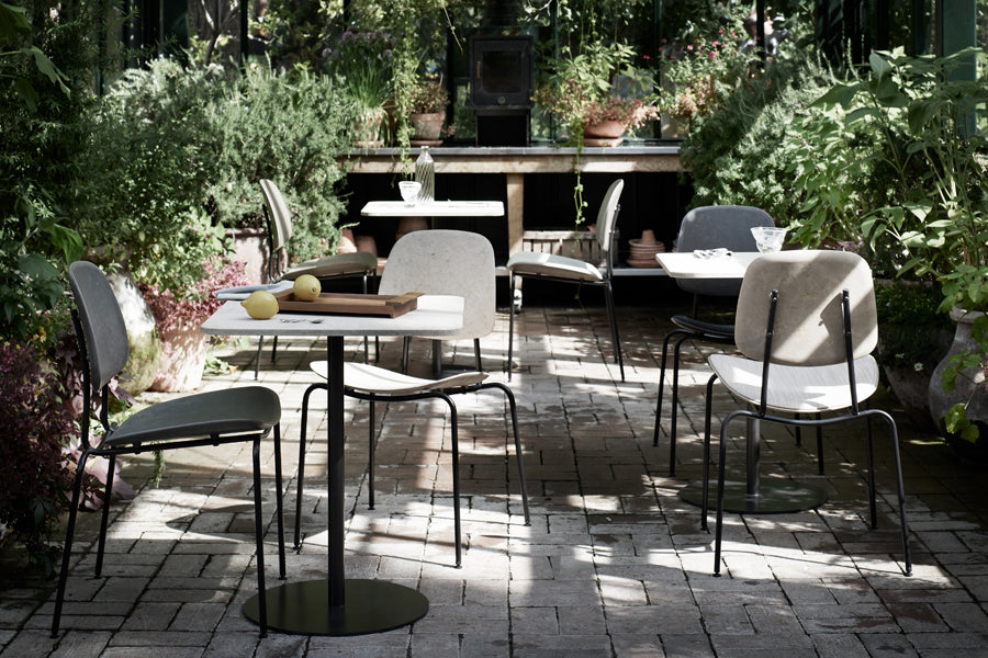 Compound Dining Chair by Mater, showing compound dining chairs in live shot.