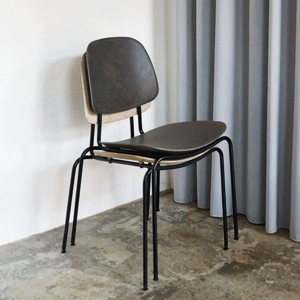 Compound Dining Chair by Mater, showing compound dining chairs in live shot.