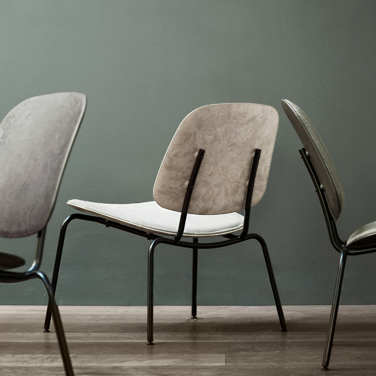 Compound Lounge Chair by Mater, showing compound lounge chairs in live shot.