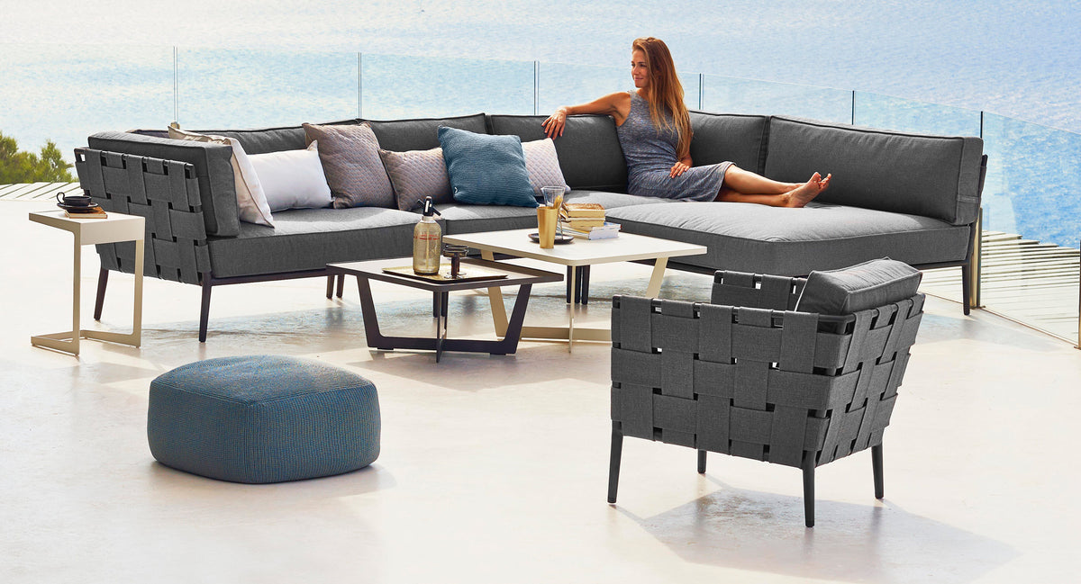 Conic Lounge Configuration 4 by Cane-Line, showing conic lounge configuration 4 in live shot.