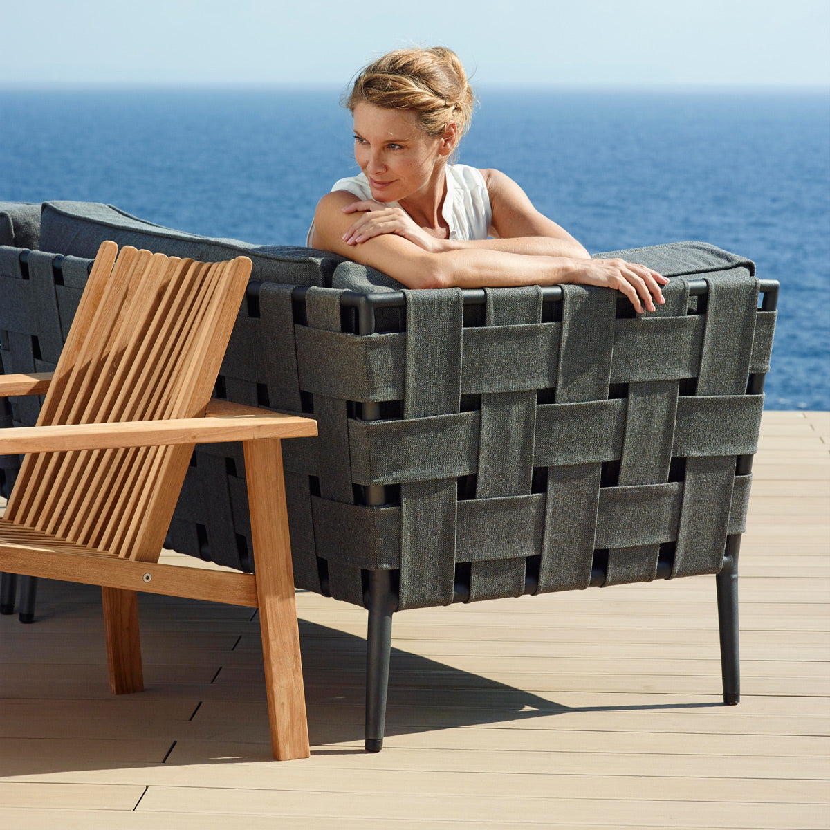 Conic Lounge Configuration 4 by Cane-Line, showing closeup view of conic lounge configuration 4 in live shot.