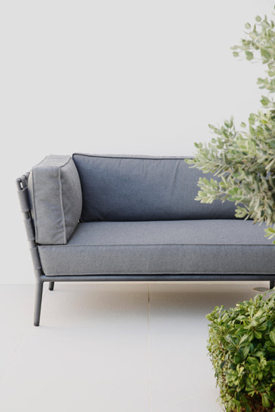 Conic Lounge Configuration 4 by Cane-Line, showing closeup view of conic lounge configuration 4 in live shot.