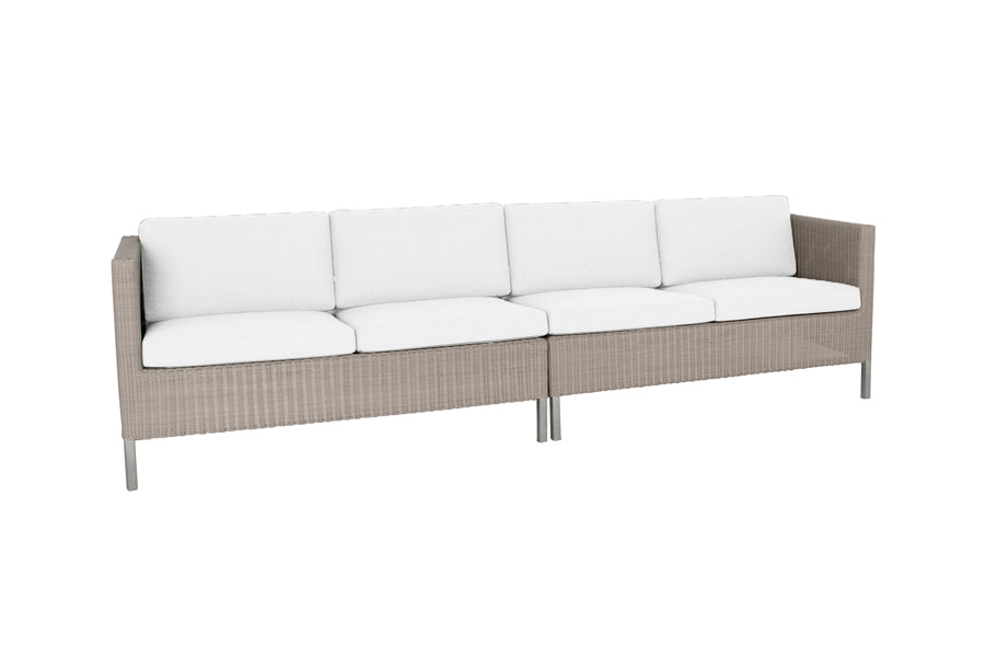 Connect Outdoor Dining Lounge by Cane-Line, showing connect outdoor lounges in white natte cushion set.