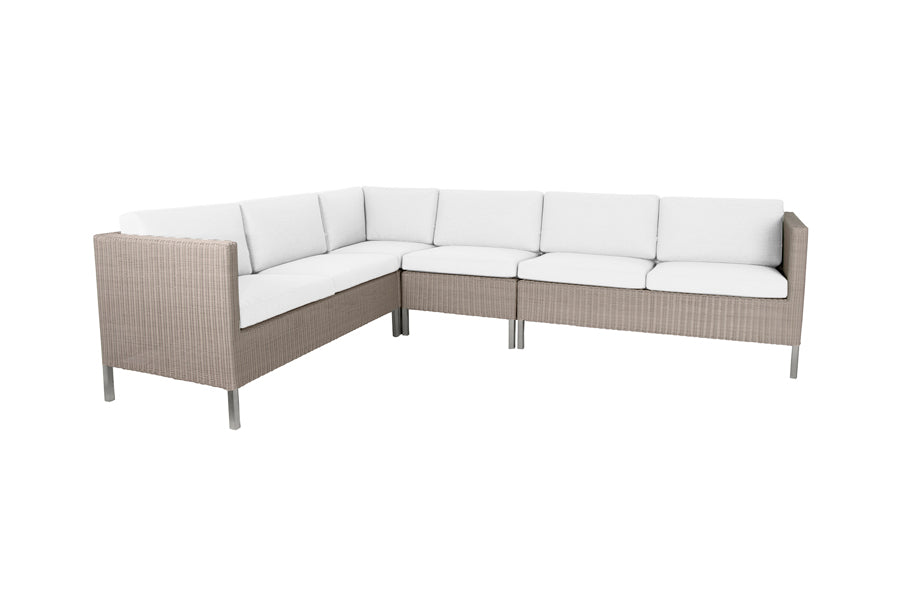 Connect Outdoor Dining Lounge by Cane-Line, showing connect outdoor lounges in white natte cushion set.