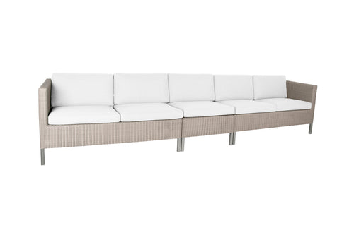 Connect Outdoor Dining Lounge by Cane-Line, showing connect outdoor lounges in white natte cushion set.