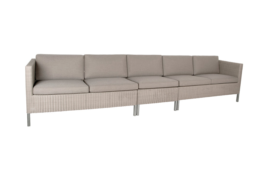 Connect Outdoor Dining Lounge by Cane-Line, showing connect outdoor lounges in taupe natte cushion set.