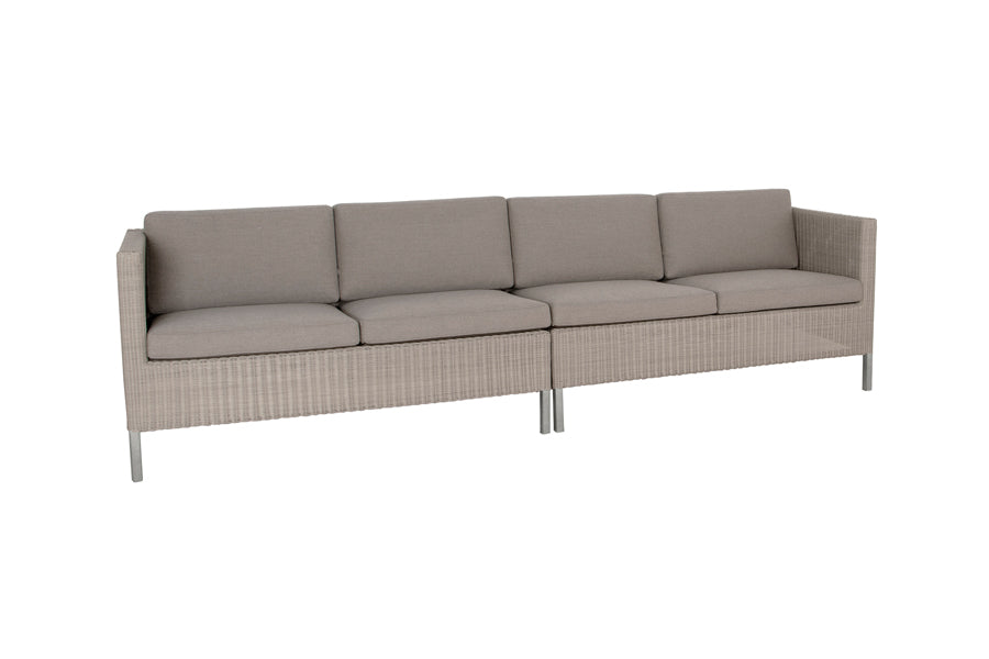 Connect Outdoor Dining Lounge by Cane-Line, showing connect outdoor lounges in taupe natte cushion set.