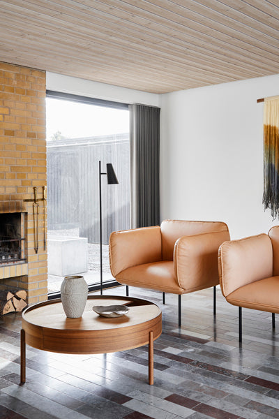 Cono Floor Lamp by Woud, showing cono floor lamp in live shot.