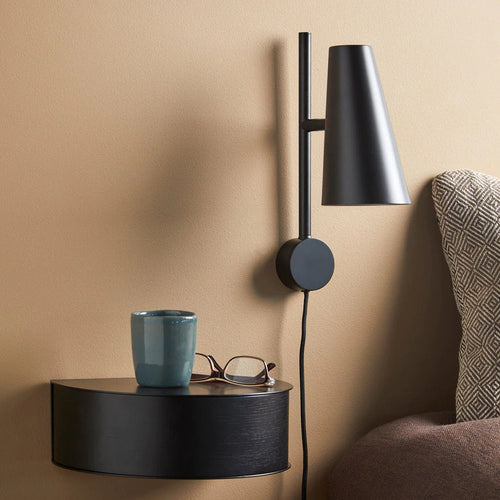 Cono Wall Lamp by Woud, showing cono wall lamp in live shot.