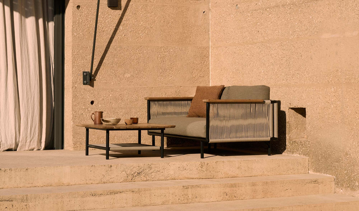 Corbey Outdoor Coffee Table by Ethnicraft, showing corbey outdoor coffee table in live shot.