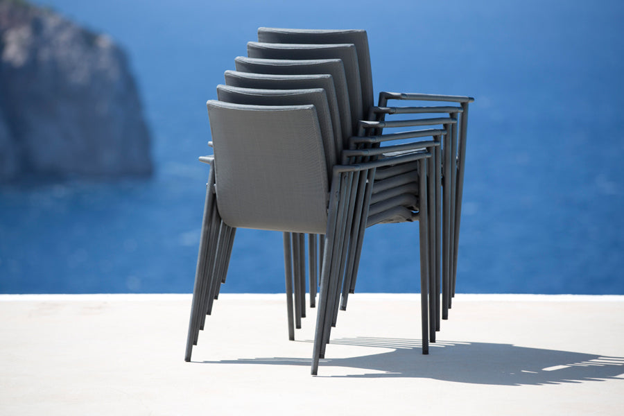 Core Chair by Cane-Line, showing core chairs in live shot.