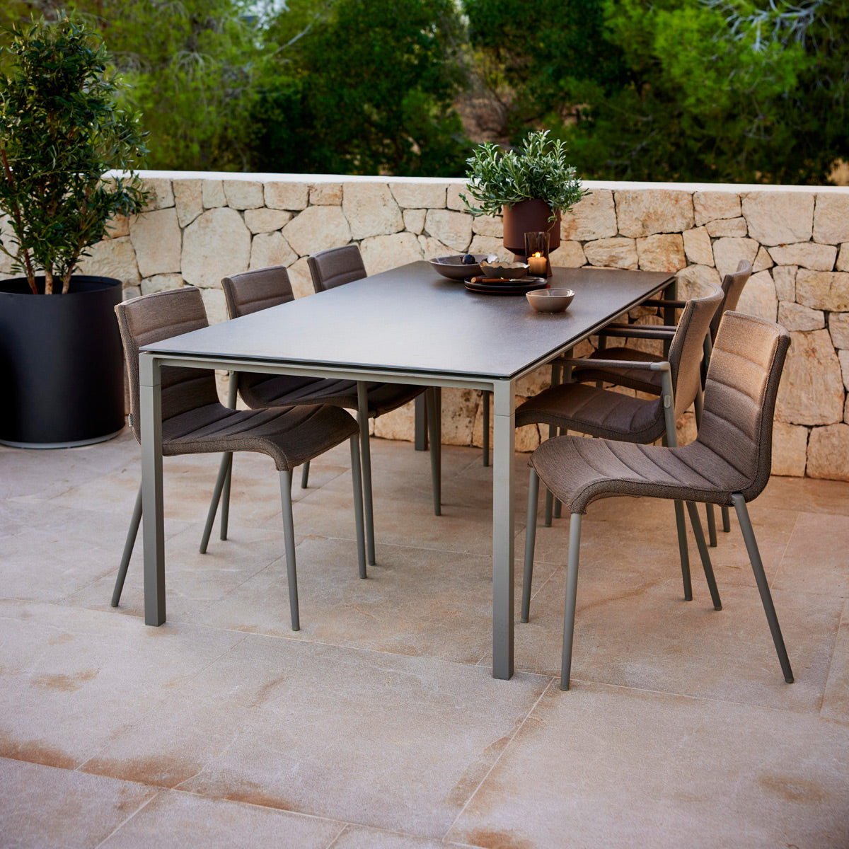 Core Chair by Cane-Line, showing core chairs in live shot.