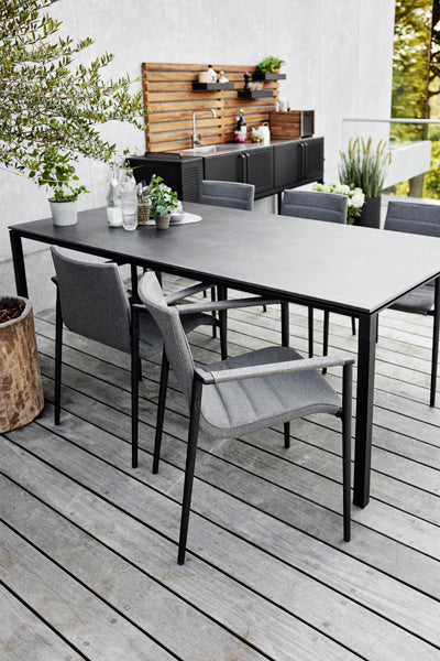 Core Chair by Cane-Line, showing core chairs in live shot.