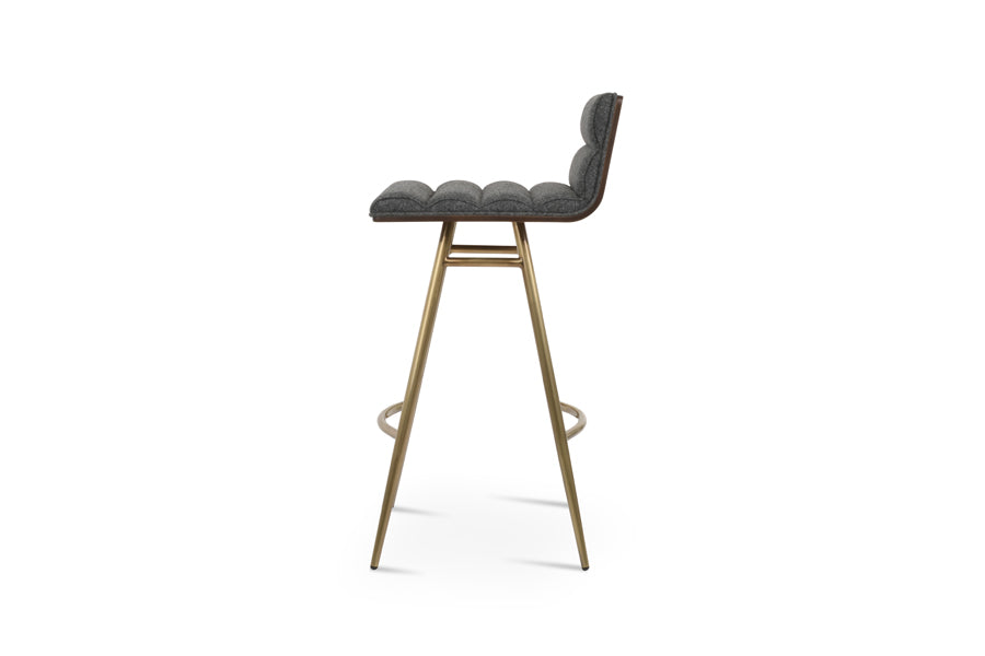 Corona Comfort Galata Stool by SohoConcept, showing side view of corona comfort galata stool in brass plated steel/camira blazer dark grey wool.
