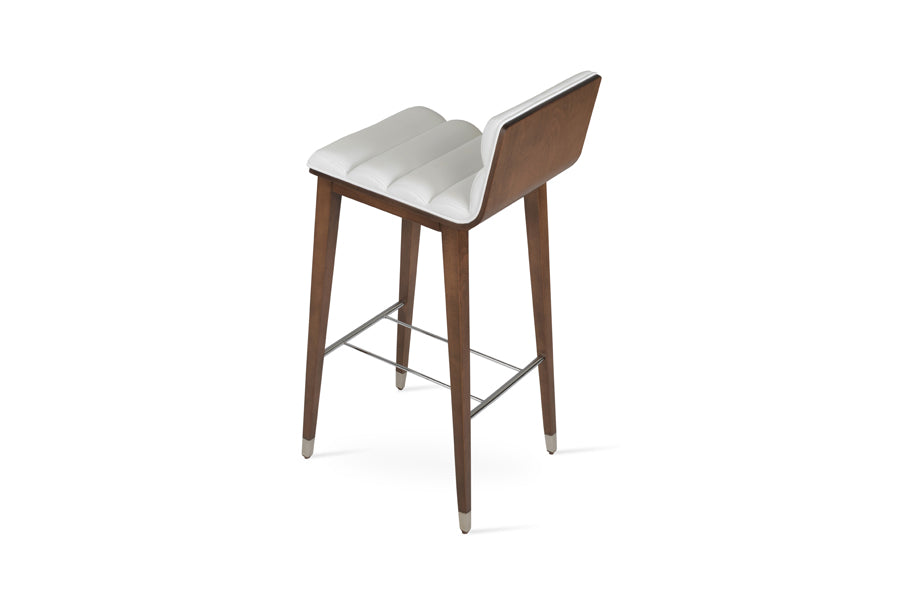 Corona Comfort Wood Stool by SohoConcept, showing back view of corona comfort wood stool in beech walnut wood with chrome ring/white leatherette.