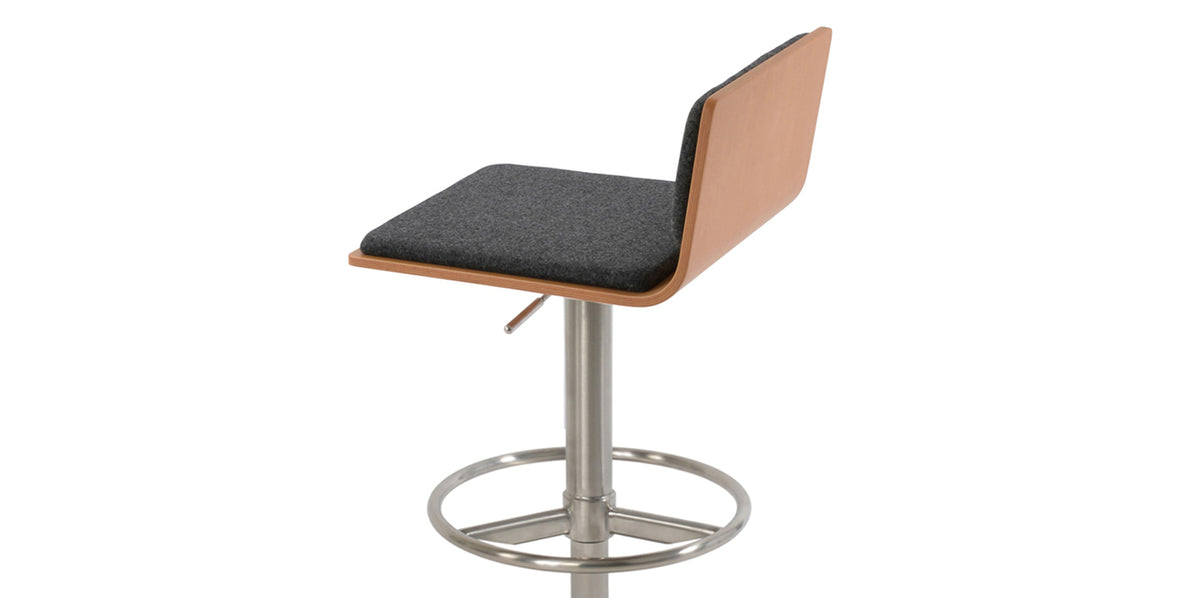 Corona Full Footrest Piston Stool by SohoConcept, showing closeup view of corona full footrest piston stool in brushed stainless steel/natural plywood seat/camira blazer dark grey wool.