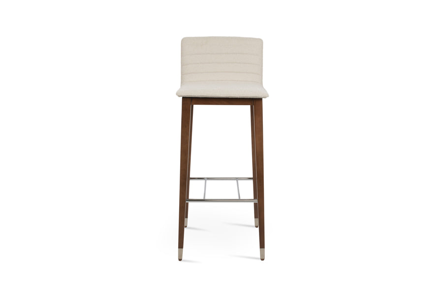 Corona Full Upholstery Wood Stool by SohoConcept, showing front view of corona full upholstery wood stool in beech walnut wood with chrome ring/boucle off white fabric.