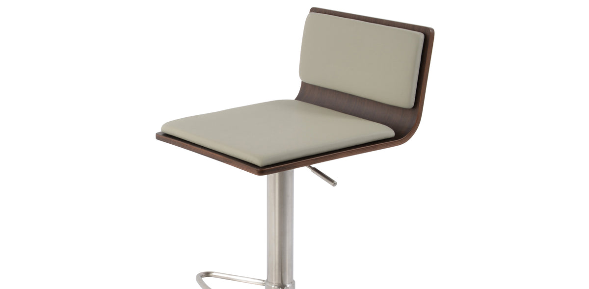 Corona Half Footrest Piston Stool-Leather by SohoConcept, showing closeup view of corona half footrest piston stool-leather in brushed stainless steel (round)/american walnut plywood seat/light grey leatherette.