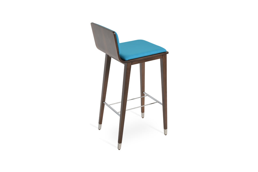 Corona Wood Stool by SohoConcept, showing back view of corona wood stool in beech walnut wood with chrome ring/camira era turquoise fabric.