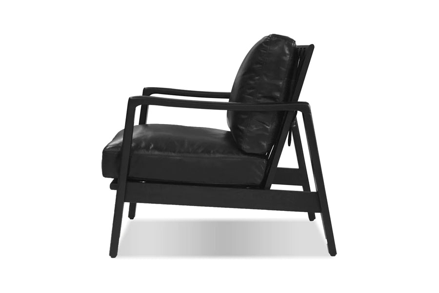 Craftsman Occasional Chair by Mobital, showing side view of craftsman occasional chairs in black ash wood/black leather.