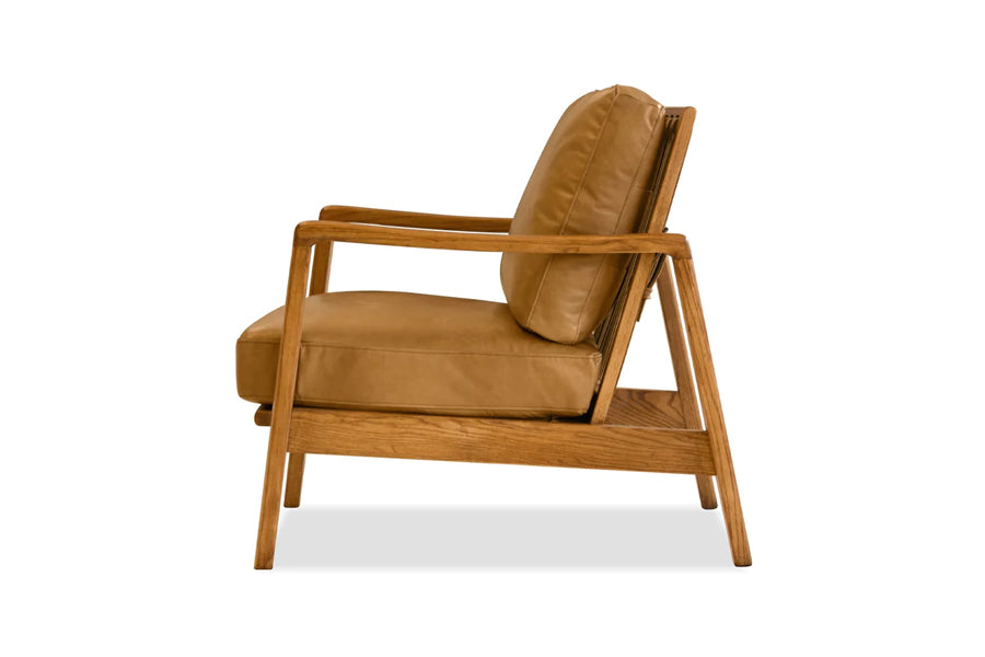 Craftsman Occasional Chair by Mobital, showing side view of craftsman occasional chairs in natural ash wood/tan leather.