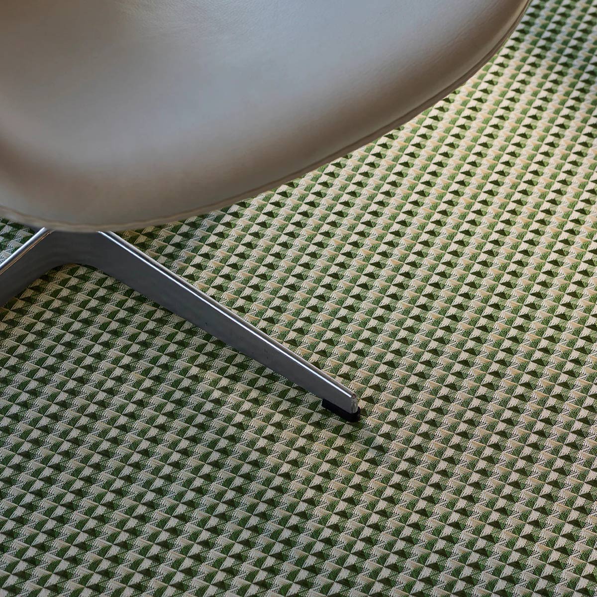 Crane Woven Floor Rug by Chilewich, showing closeup view of crane woven floor rug in live shot.