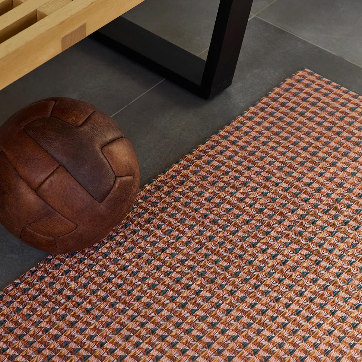 Crane Woven Floor Rug by Chilewich, showing closeup view of crane woven floor rug in live shot.