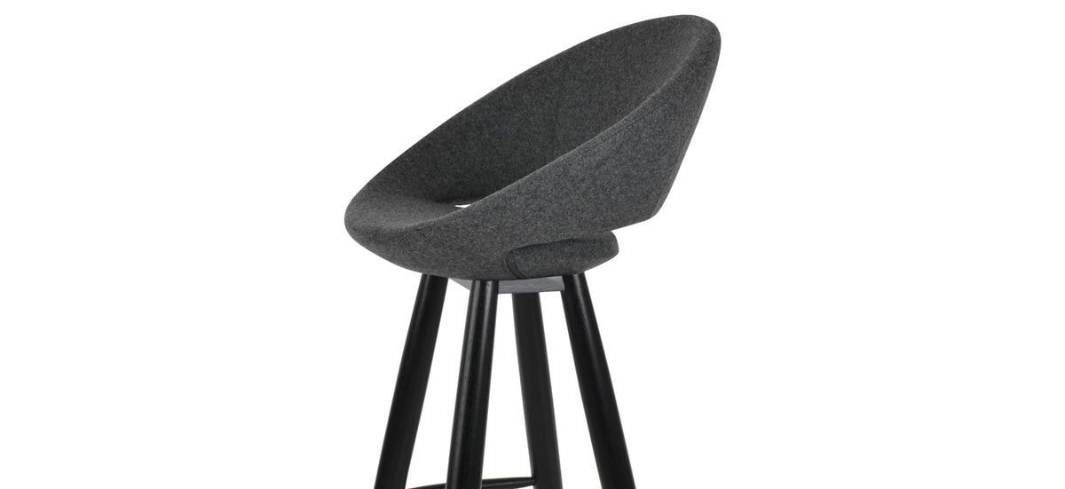 Crescent Baba Stool by SohoConcept, showing closeup view of crescent baba stool in teak wenge wood/camira blazer dark grey wool.