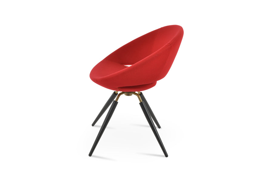 Crescent Carrot Swivel Dining Chair by SohoConcept, showing side view of crescent carrot swivel dining chair in black powder & brass/fushcia ankara wool.