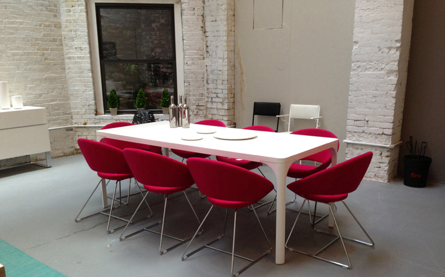 Crescent Wire Chair by SohoConcept, showing cresecent wire chairs in live shot.