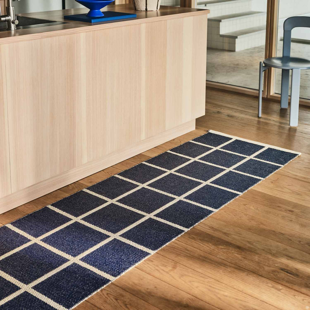 CRISS Dark Blue Runner Rug by Pappelina, showing criss dark blue runner rug in live shot.