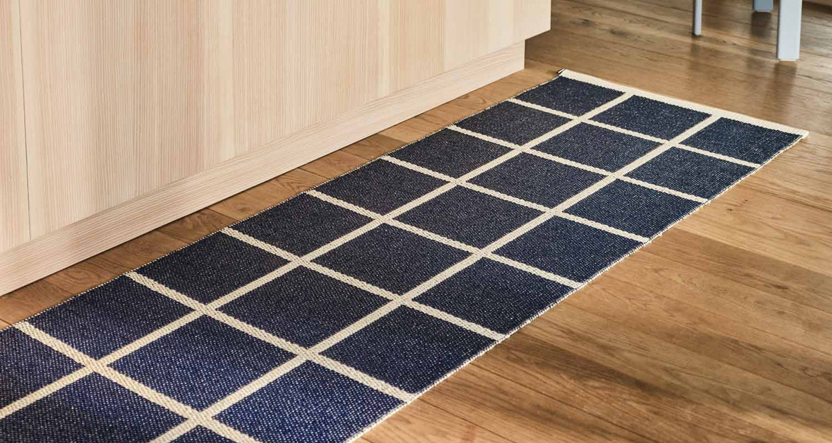 CRISS Dark Blue Runner Rug by Pappelina, showing criss dark blue runner rug in live shot.