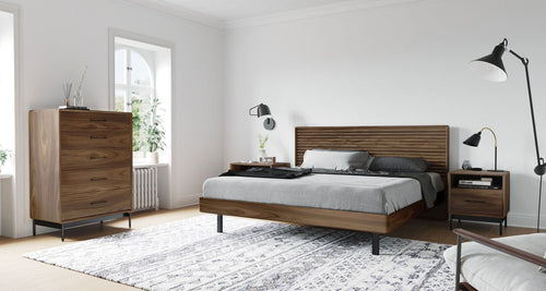 Cross Linq Bed by BDI, showing cross linq bed with side table & chest in live shot.