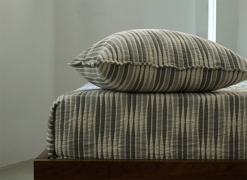 Curve Bedding Collection by Area, showing closeup view of curve bedding collection in live shot.