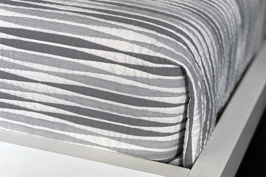 Curve Bedding Collection by Area, showing closeup view of curve bedding collection in live shot.