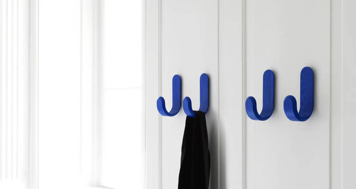 Curve Hook by Normann Copenhagen, showing curve hook in live shot.