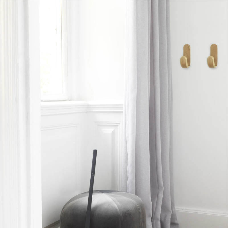 Curve Hook by Normann Copenhagen, showing curve hook in live shot.