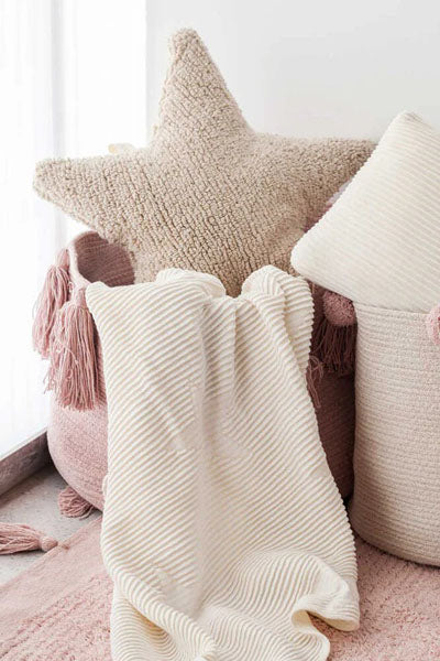 Star Cushion by Lorena Canals, showing star cushion in live shot.