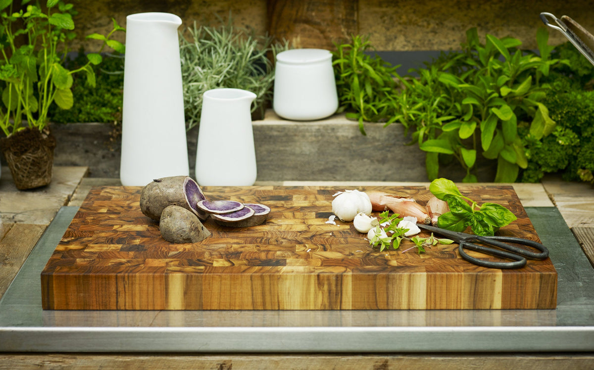 Dania Cutting Teak Board by Skagerak, showing cutting teak board in live shot.