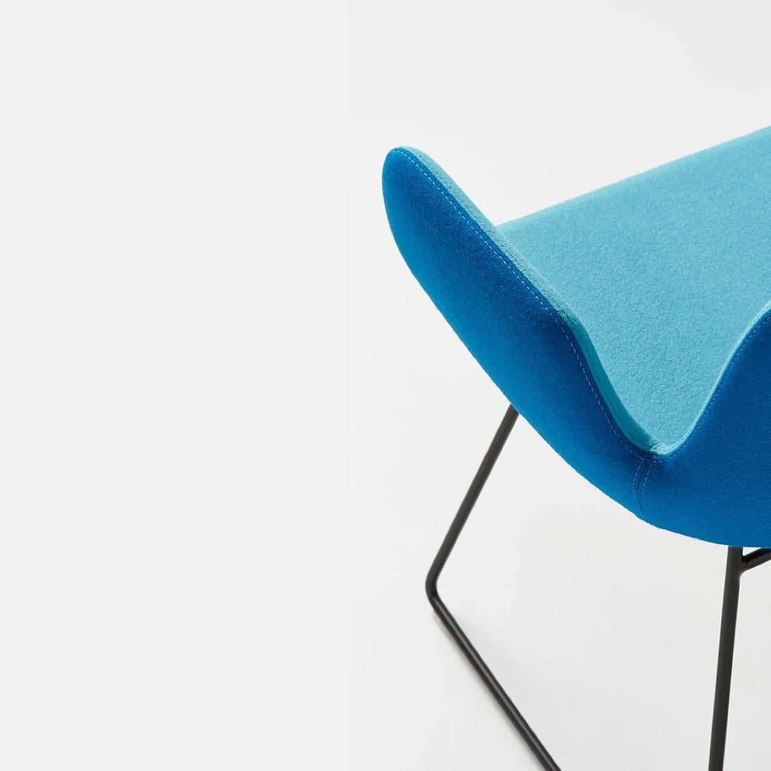 Daisy Sled Chair by B&T, showing closeup view of daisy sled chair in live shot.
