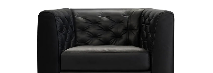 Dalton Lounge Chair by Mobital, showing closeup view of dalton lounge chair in vintage black leather/black powder coated legs.