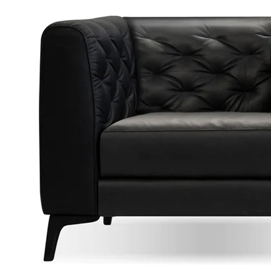 Dalton Lounge Chair by Mobital, showing closeup view of dalton lounge chair in vintage black leather/black powder coated legs.