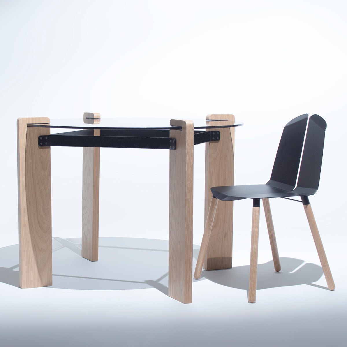 Davis Dining Table by Tronk Design, showing davis dining table in live shot.