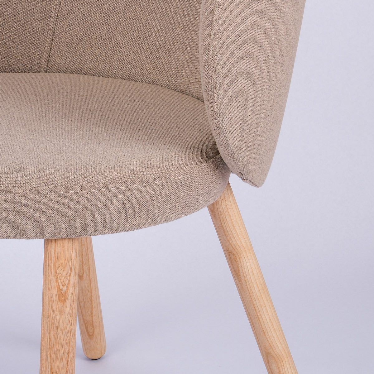 Dazzle Wood Chair by Kollektiff, showing closeup view of dazzle wood chair in live shot.