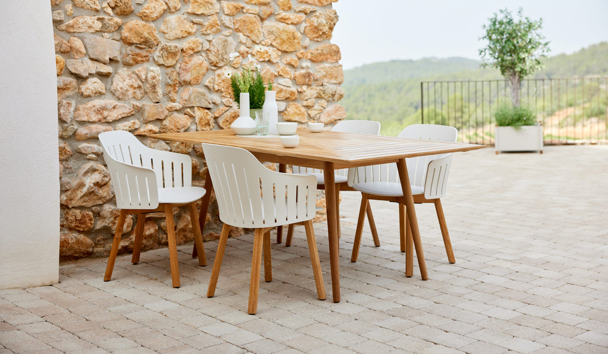 Define Dining Table by Cane-Line, showing define dining table in live shot.