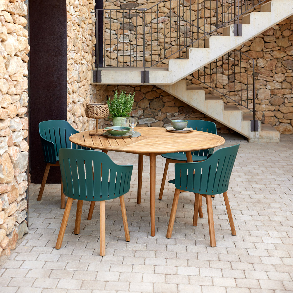 Define Dining Table by Cane-Line, showing define dining table in live shot.